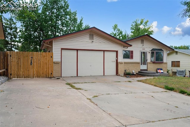 single story home with a garage