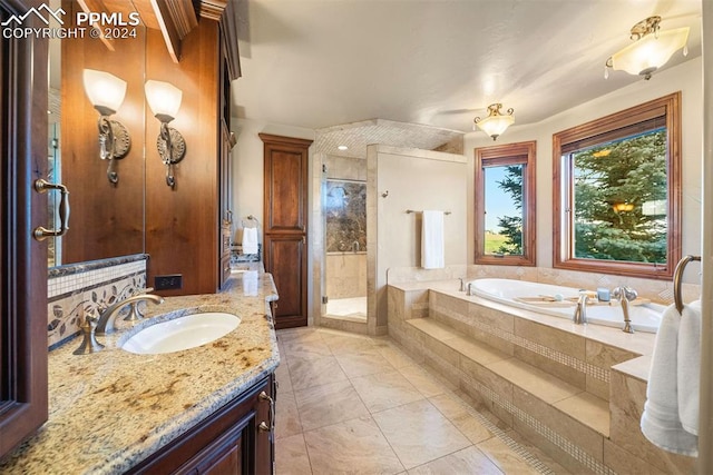 bathroom featuring vanity, separate shower and tub, and tile patterned floors