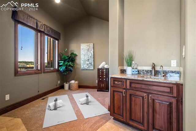 19155 Lochmere Ct, Monument, CO 80132 - bathroom featuring a sink and vaulted ceiling