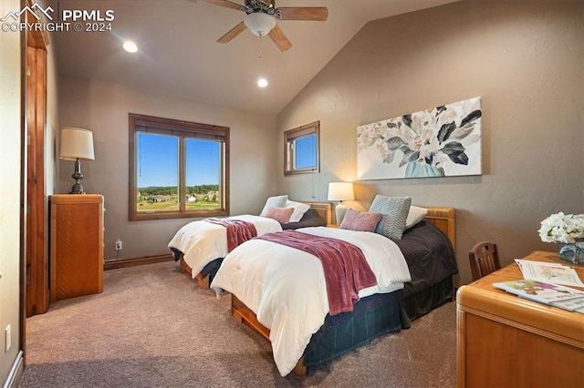 bedroom with lofted ceiling, carpet, and ceiling fan