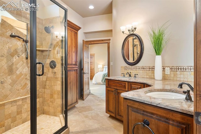 19155 Lochmere Ct, Monument, CO 80132 - ensuite bathroom with a stall shower, vanity, and tile patterned flooring
