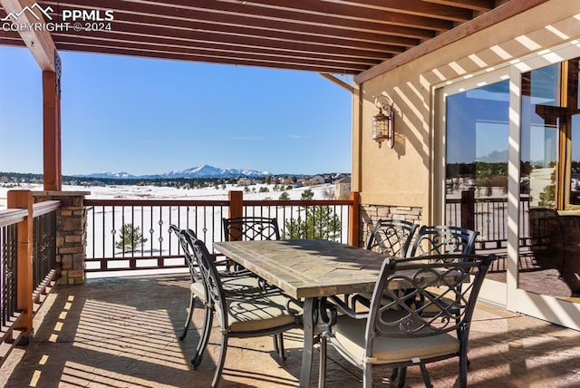 19155 Lochmere Ct, Monument, CO 80132 - balcony with a mountain view and outdoor dining area