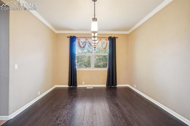 unfurnished dining area featuring an inviting chandelier, ornamental molding, and hardwood / wood-style floors