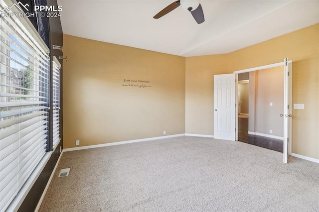 unfurnished bedroom with carpet flooring and ceiling fan