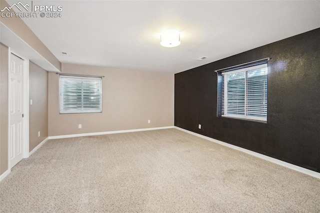 view of carpeted spare room