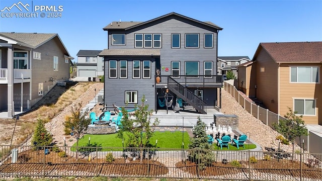 rear view of house featuring a patio area