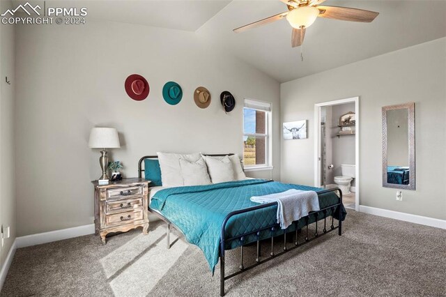 carpeted bedroom with ceiling fan, lofted ceiling, and ensuite bathroom