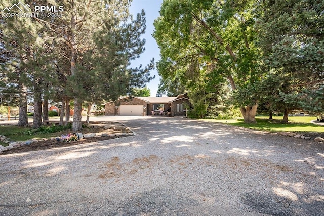 view of front of property with a garage