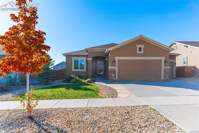 view of front of property featuring a garage