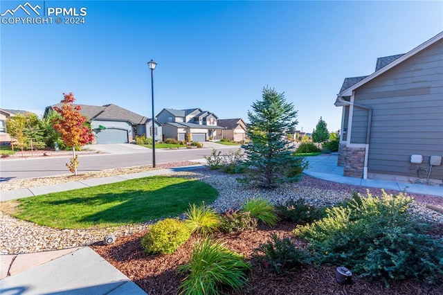 view of yard featuring a garage