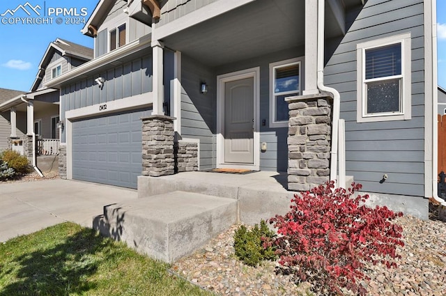 entrance to property featuring a garage