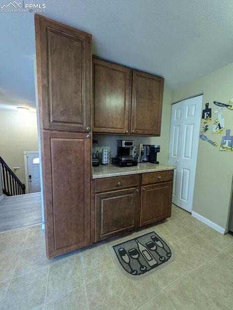 kitchen with dark brown cabinets