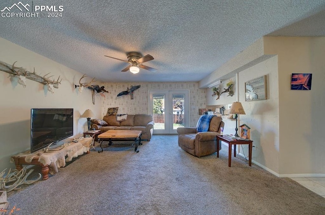 carpeted living room featuring french doors, a textured ceiling, and ceiling fan