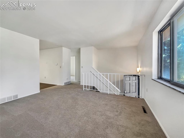 empty room with carpet floors