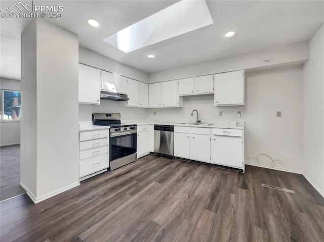 kitchen with dark hardwood / wood-style flooring, stainless steel appliances, white cabinets, and sink