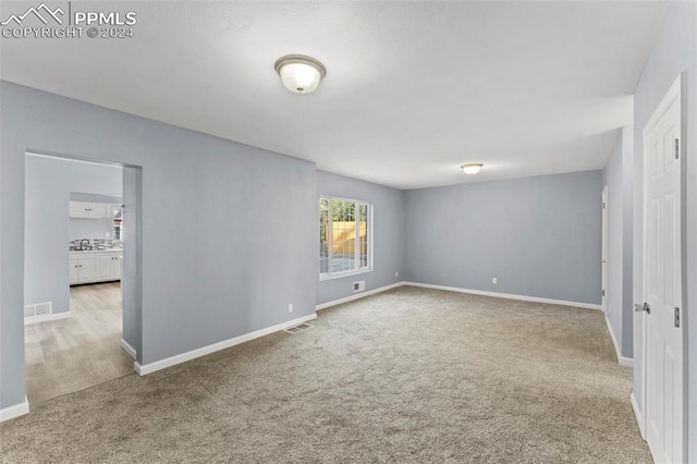 view of carpeted spare room