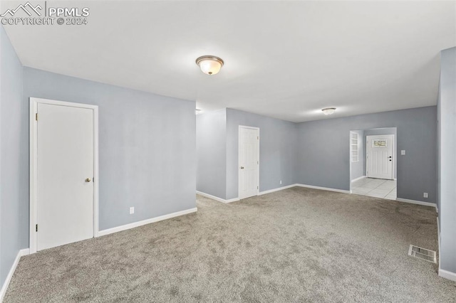 empty room with light carpet