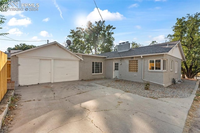 back of house featuring central AC