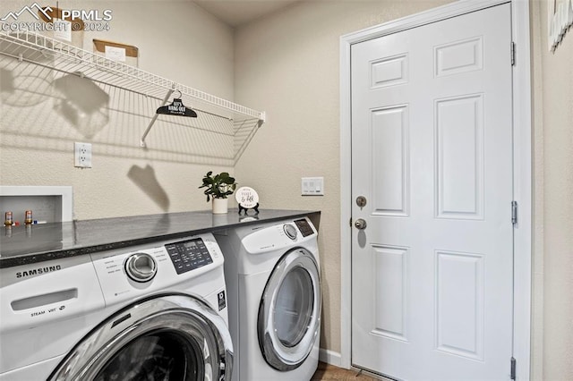 laundry area featuring independent washer and dryer