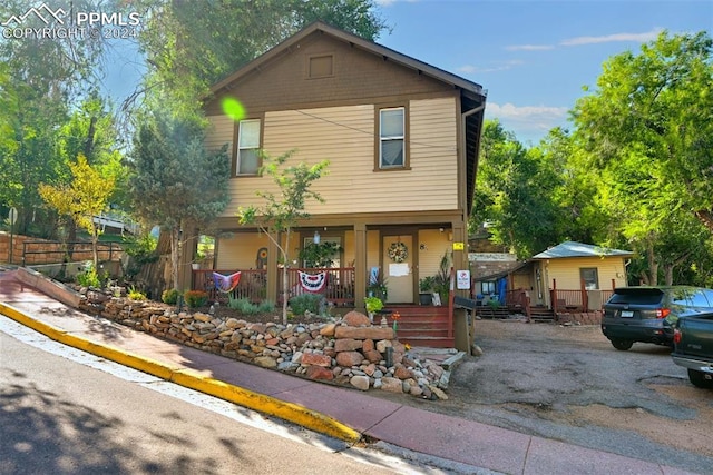 front facade featuring covered porch