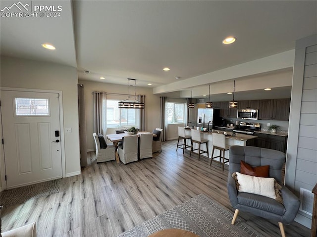 living room featuring light wood-type flooring