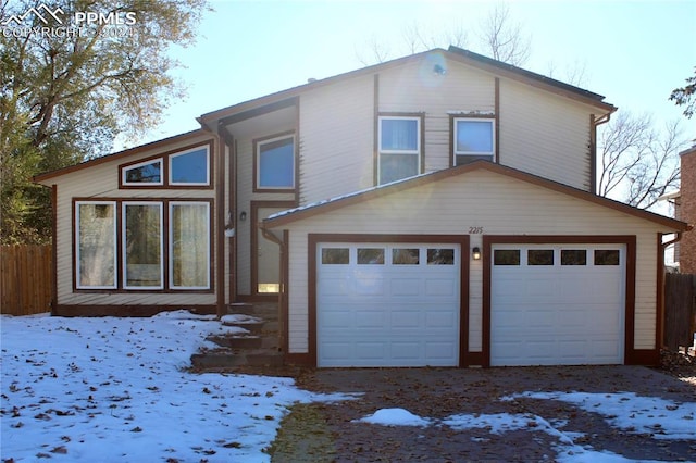 view of front of property with a garage