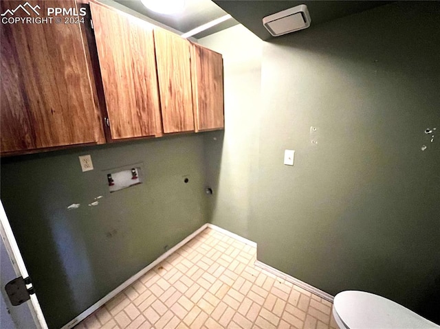 laundry area featuring washer hookup, cabinets, and hookup for an electric dryer