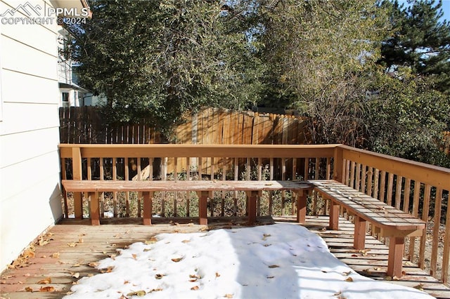 view of snow covered deck