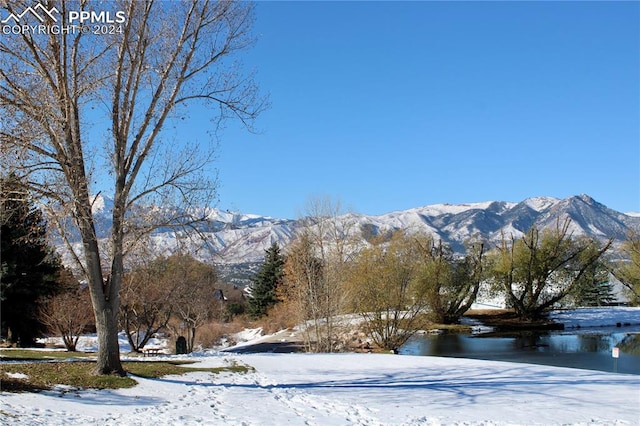 mountain view with a water view