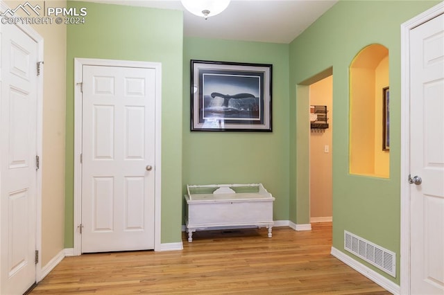 hallway featuring light hardwood / wood-style floors