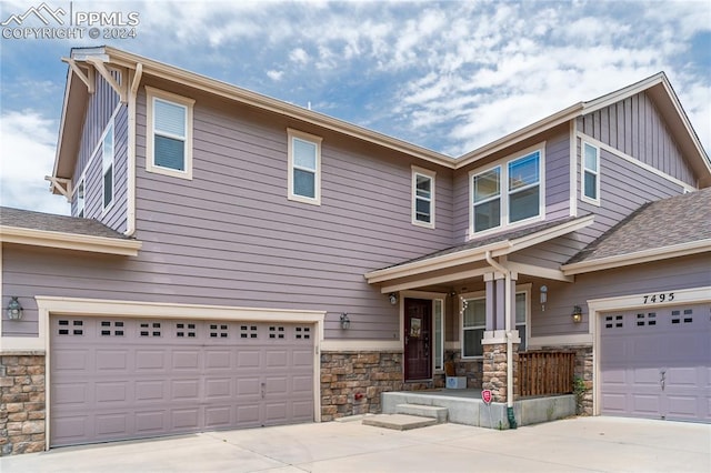 craftsman inspired home with a garage