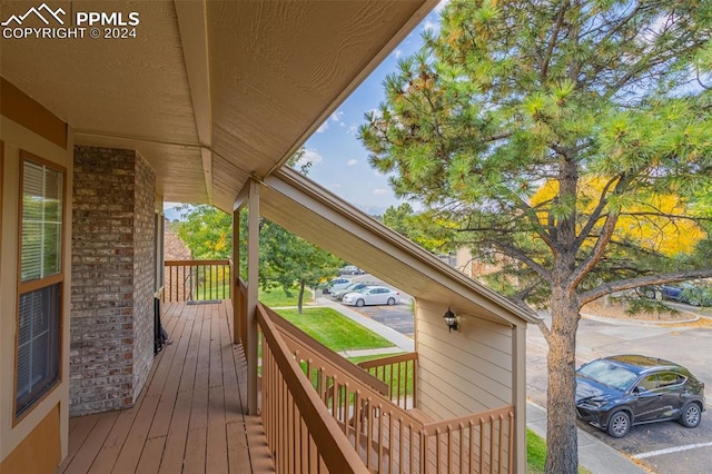 wooden deck featuring covered porch