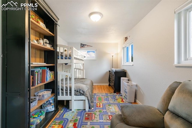 living area with hardwood / wood-style floors