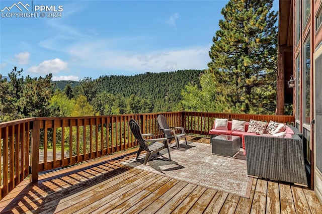 deck with an outdoor living space