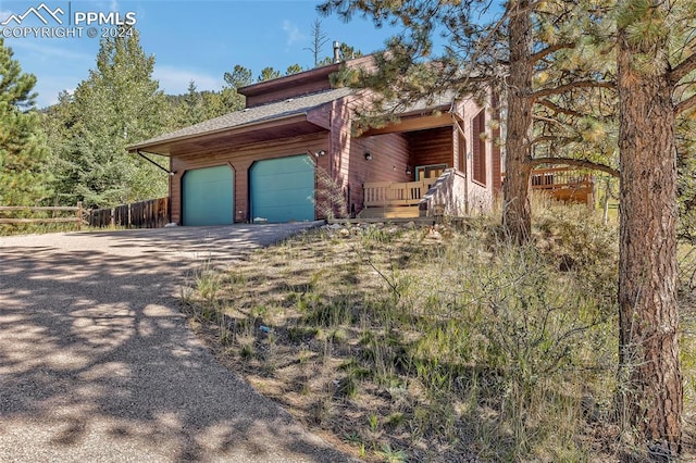 view of front of house with a garage