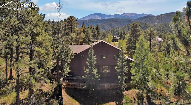 2601 Vista Glen Ct, Woodland Park, CO 80863 - bird's eye view featuring a wooded view and a mountain view