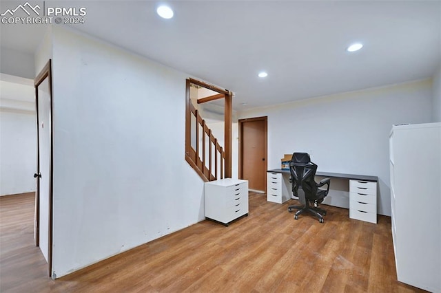 office with light hardwood / wood-style floors