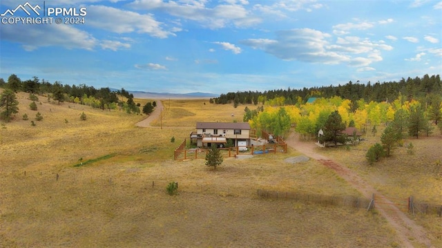 birds eye view of property featuring a rural view