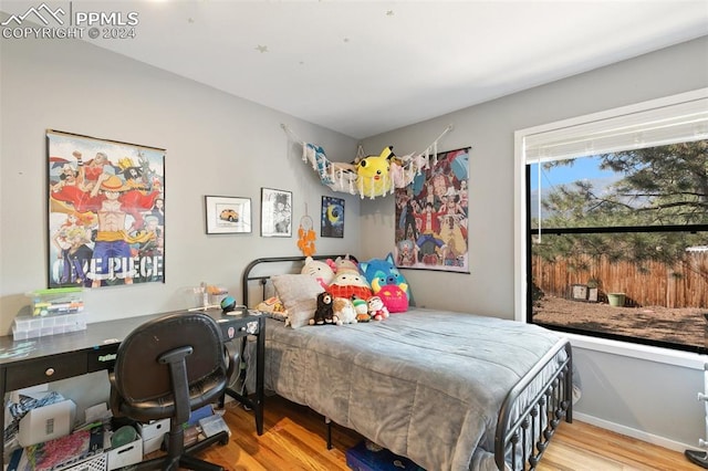 bedroom featuring light hardwood / wood-style flooring