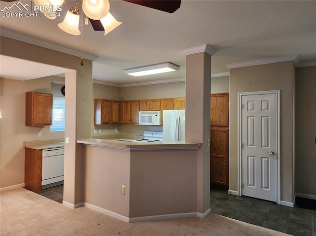 kitchen with dark colored carpet, white appliances, ornamental molding, kitchen peninsula, and ceiling fan