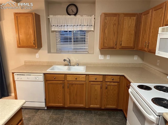 kitchen with white appliances and sink