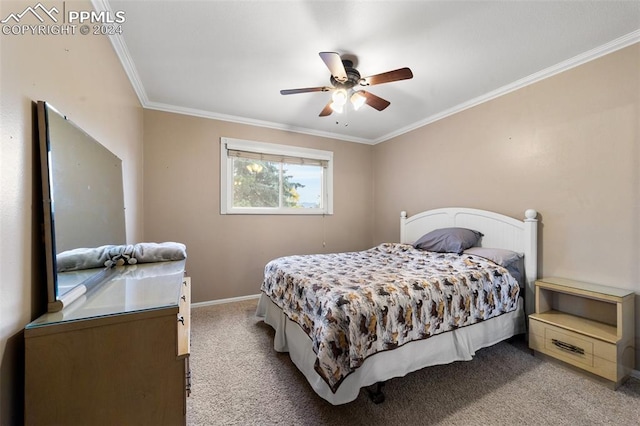 bedroom featuring ceiling fan, light colored carpet, and crown molding