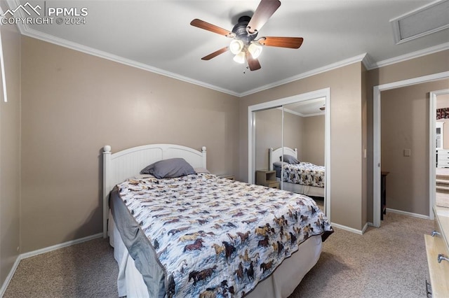 bedroom with crown molding, ceiling fan, a closet, and light colored carpet