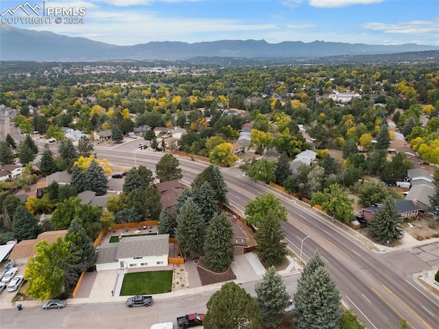 birds eye view of property featuring a mountain view