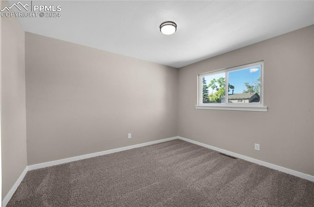 empty room with carpet floors