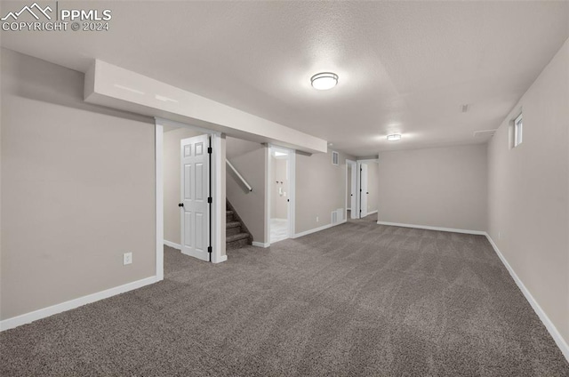 basement with carpet flooring