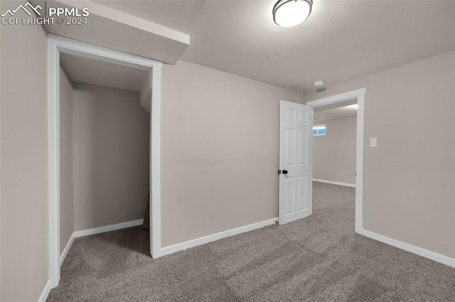 unfurnished bedroom with carpet