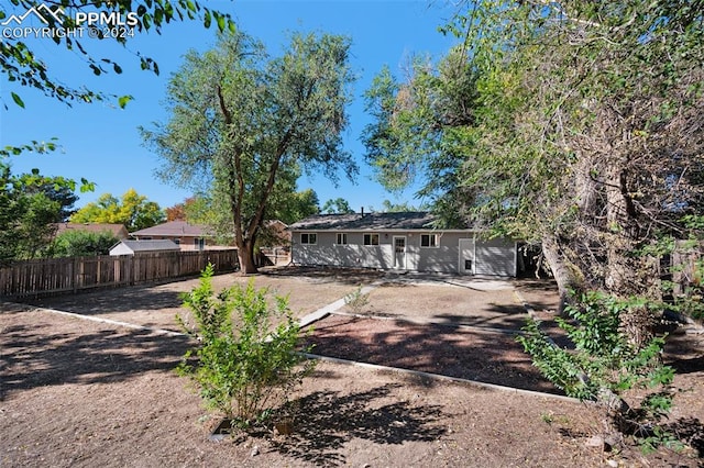 rear view of house with a patio