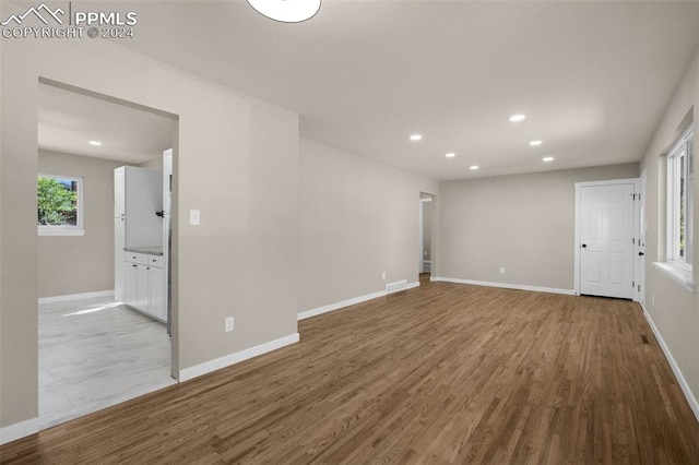 empty room with light wood-type flooring