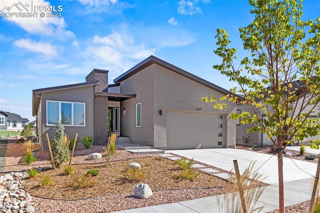 view of front of home with a garage